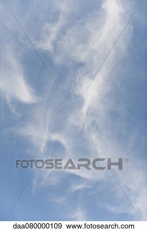 Stock Photo - Wispy clouds in sky. Fotosearch