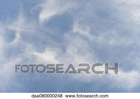 Stock Photo - Wispy clouds in sky. Fotosearch