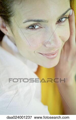 Stock Photo - Woman, close-up of face, portrait. Fotosearch