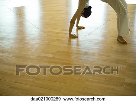 Woman doing bridge position, side view, cropped View Large Photo Image Stock Photo - Woman doing bridge position, side view, cropped. Fotosearch