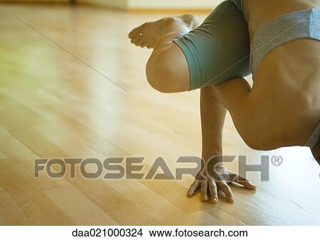 Woman doing crow pose View Large Photo Image Picture - Woman doing crow pose. Fotosearch