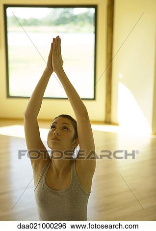 Stock Photograph - Woman doing yoga pose. Fotosearch