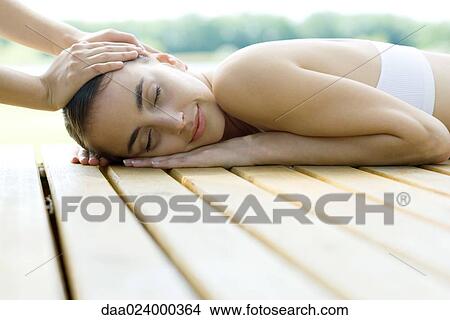 Woman having head massage View Large Photo Image Picture - Woman having head massage. Fotosearch
