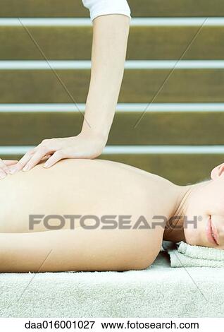 Woman having massage View Large Photo Image Stock Photo - Woman having massage. Fotosearch