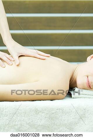 Woman having massage View Large Photo Image Stock Photo - Woman having massage. Fotosearch