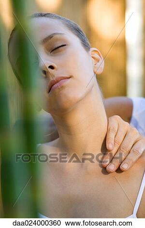 Woman having neck massage View Large Photo Image Stock Image - Woman having neck massage. Fotosearch