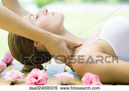 Stock Photograph - Woman having neck massage. Fotosearch