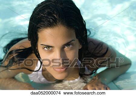 Picture - Woman in swimming pool. Fotosearch