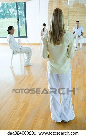 Woman leading group therapy session, rear view View Large Photo Image Stock Photography - Woman leading group therapy session, rear view. Fotosearch
