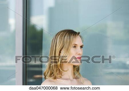 Woman looking away in thought, portrait View Large Photo Image Stock Photo - Woman looking away in thought, portrait. Fotosearch