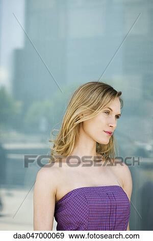 Woman looking away in thought, portrait View Large Photo Image Stock Photo - Woman looking away in thought, portrait. Fotosearch