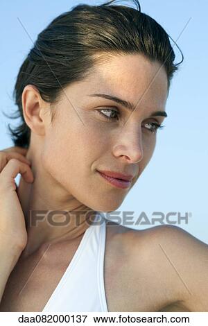Woman looking away in thought, portrait View Large Photo Image Stock Photo - Woman looking away in thought, portrait. Fotosearch