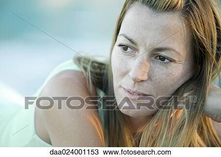 Woman looking away, portrait View Large Photo Image Stock Image - Woman looking away, portrait. Fotosearch