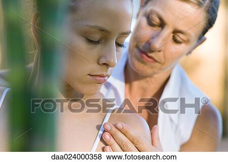 Woman receiving therapy, eyes closed View Large Photo Image Stock Photo - Woman receiving therapy, eyes closed. Fotosearch