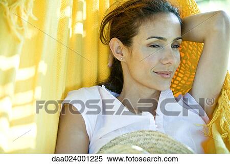 Woman resting in hammock, head and shoulders View Large Photo Image Stock Photography - Woman resting in hammock, head and shoulders. Fotosearch