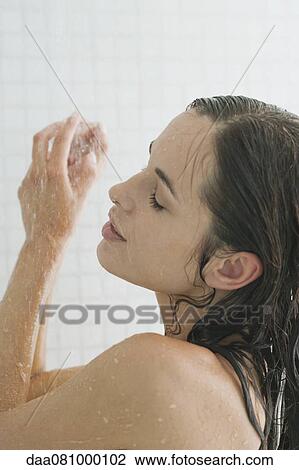 Woman showering View Large Photo Image Stock Image - Woman showering. Fotosearch