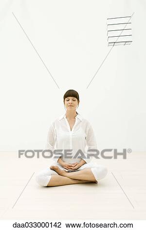 Woman sitting in meditative position, eyes closed View Large Photo Image Stock Image - Woman sitting in meditative position, eyes closed. Fotosearch