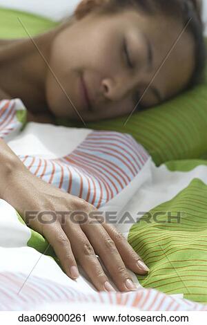 Stock Image - Woman sleeping. Fotosearch