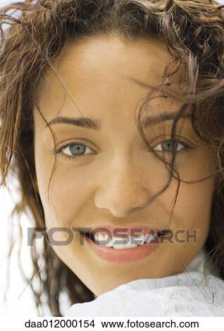 Picture - Woman smiling, close-up of face, portrait. Fotosearch