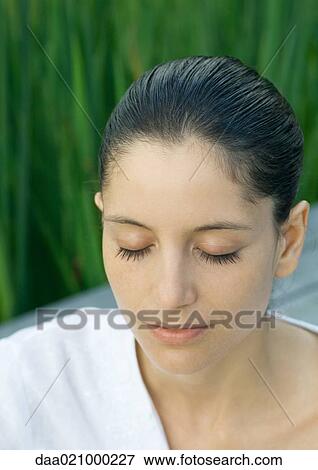 Woman with eyes closed, head and shoulders, portrait View Large Photo Image Stock Photo - Woman with eyes closed, head and shoulders, portrait. Fotosearch