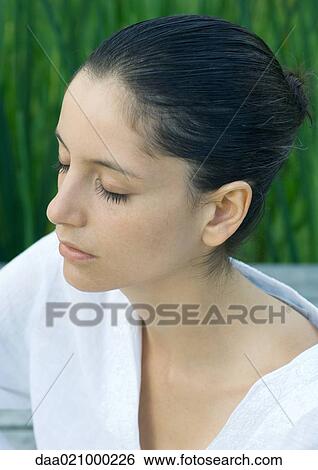 Woman with eyes closed, head and shoulders, portrait View Large Photo Image Stock Photograph - Woman with eyes closed, head and shoulders, portrait. Fotosearch