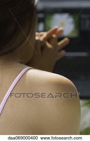 Woman with hands clasped, over the shoulder view View Large Photo Image Stock Image - Woman with hands clasped, over the shoulder view. Fotosearch