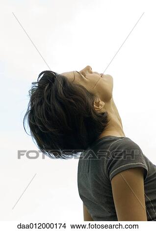 Woman with head back, smiling View Large Photo Image Picture - Woman with head back, smiling. Fotosearch