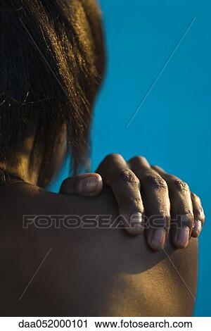 Woman's hand on bare shoulder View Large Photo Image Stock Image - Woman's hand on bare shoulder. Fotosearch