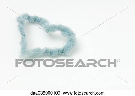 Stock Photo - Wool twisted into heart shape. Fotosearch