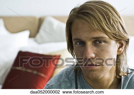 Stock Image - Young man, portrait. Fotosearch