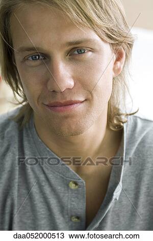 Stock Image - Young man, portrait. Fotosearch