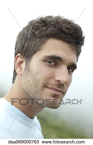Stock Image - Young man, portrait. Fotosearch