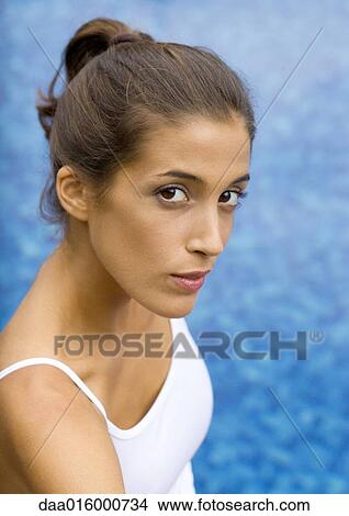 Young woman by poolside, portrait View Large Photo Image Picture - Young woman by poolside, portrait. Fotosearch
