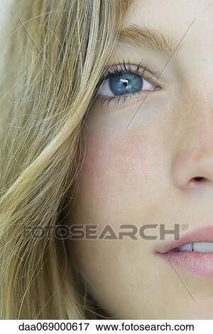 Young woman, close-up portrait View Large Photo Image Stock Photo - Young woman, close-up portrait. Fotosearch
