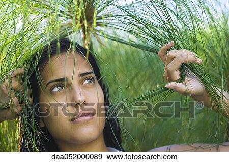 Young woman exploring tropical travel destination View Large Photo Image Stock Photo - Young woman exploring tropical travel destination. Fotosearch