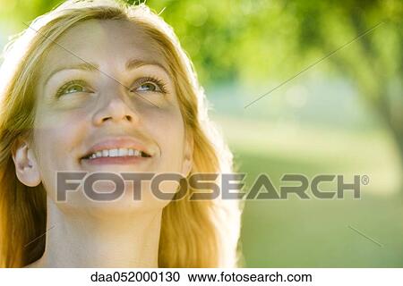 Stock Image - Young woman, portrait. Fotosearch