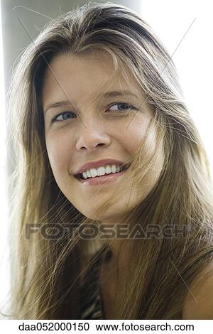 Stock Image - Young woman, portrait. Fotosearch