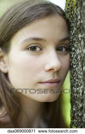 Young woman, portrait View Large Photo Image Stock Image - Young woman, portrait. Fotosearch