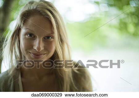 Stock Photo - Young woman, portrait. Fotosearch