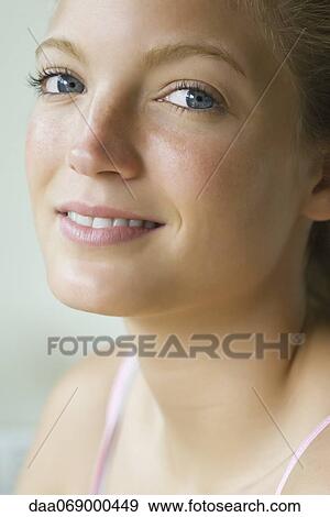 Stock Photo - Young woman, portrait. Fotosearch
