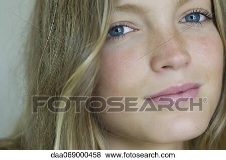 Stock Photo - Young woman, portrait. Fotosearch