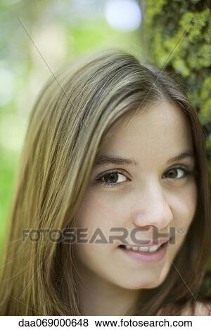 Stock Photo - Young woman, portrait. Fotosearch