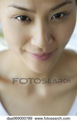 Stock Photo - Young woman, portrait. Fotosearch