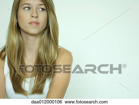 Stock Photograph - Young woman, portrait. Fotosearch