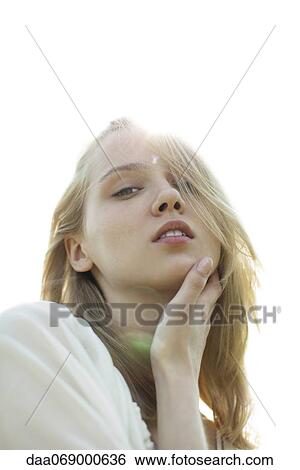 Stock Photograph - Young woman, portrait. Fotosearch