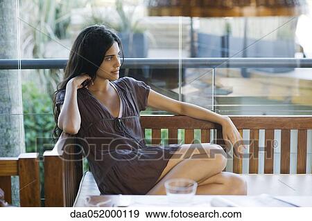 Stock Photo - Young woman relaxing. Fotosearch