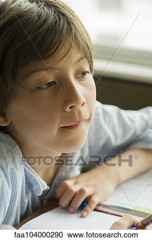 Boy daydreaming View Large Photo Image Stock Image - Boy daydreaming. Fotosearch
