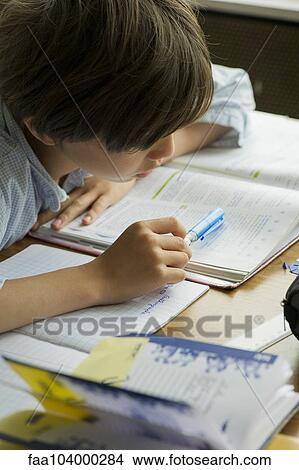 Boy studying View Large Photo Image Picture - Boy studying. Fotosearch