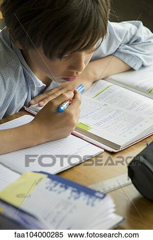 Boy studying View Large Photo Image Stock Photography - Boy studying. Fotosearch