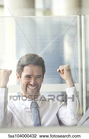 Stock Image - Businessman exhibiting exuberance. Fotosearch